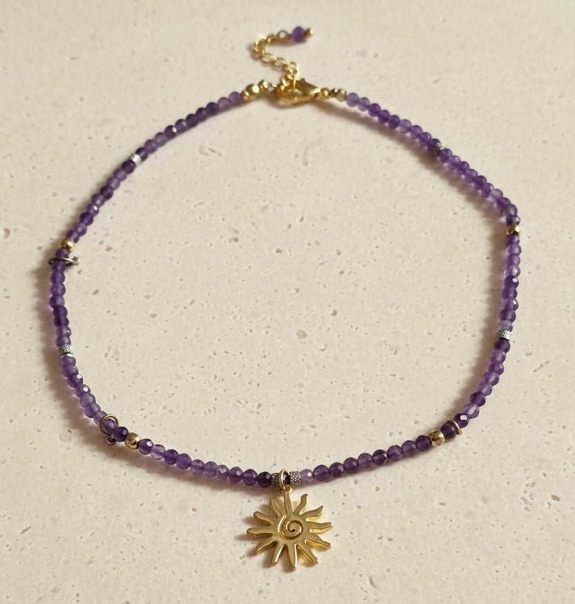 Amethyst Soleil necklace with natural violet gemstones and gold-plated sun pendant
