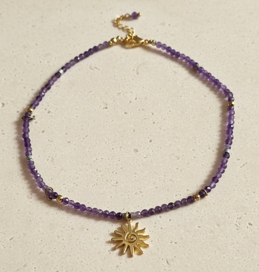 Amethyst Soleil necklace with natural violet gemstones and gold-plated sun pendant