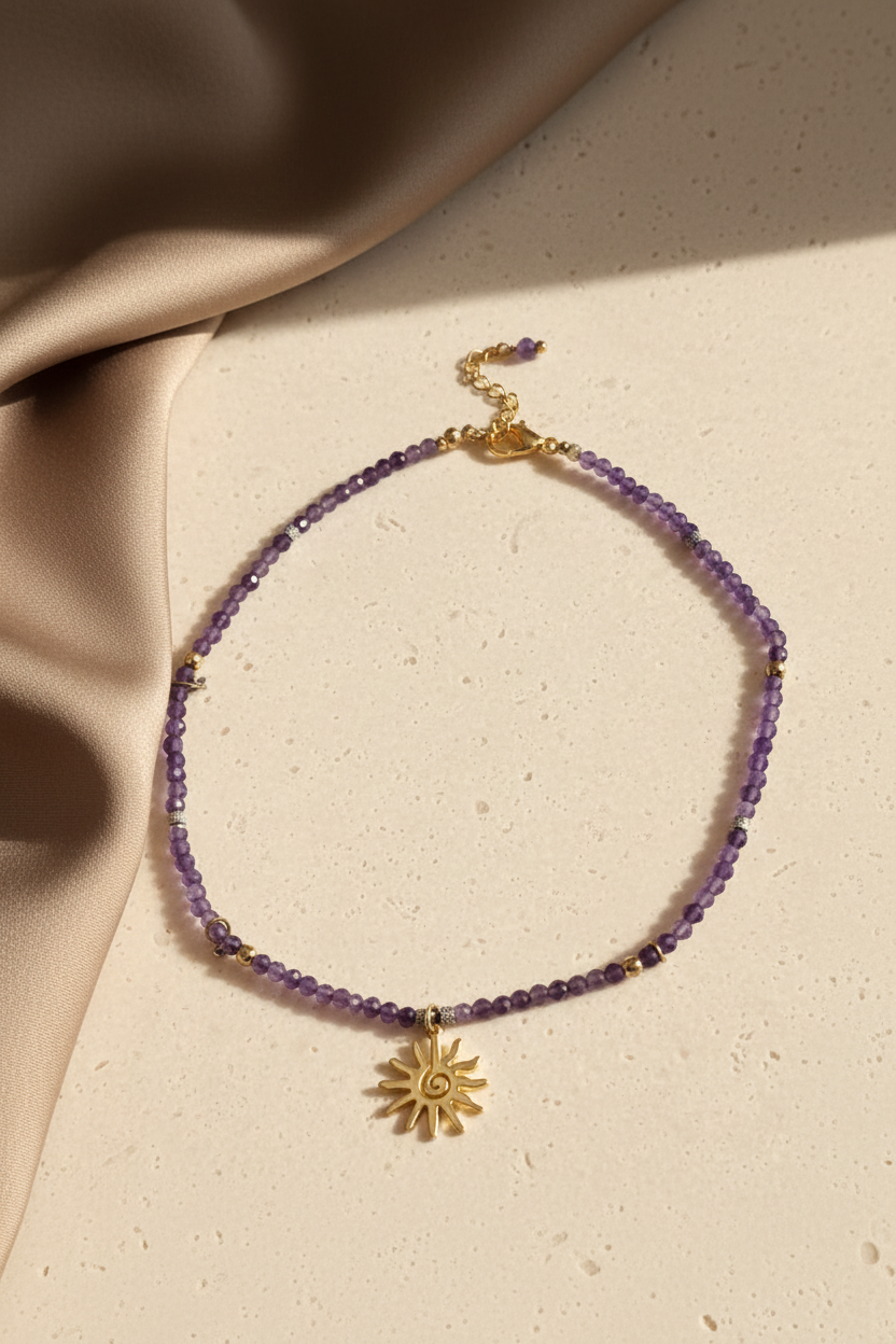 Natural amethyst sun necklace styled in a luxury neutral setting