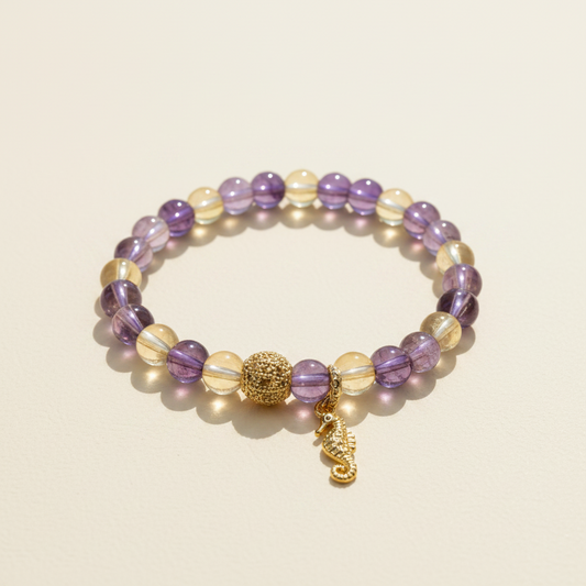 Natural ametrine bracelet with violet and golden beads and a gold-plated seahorse charm