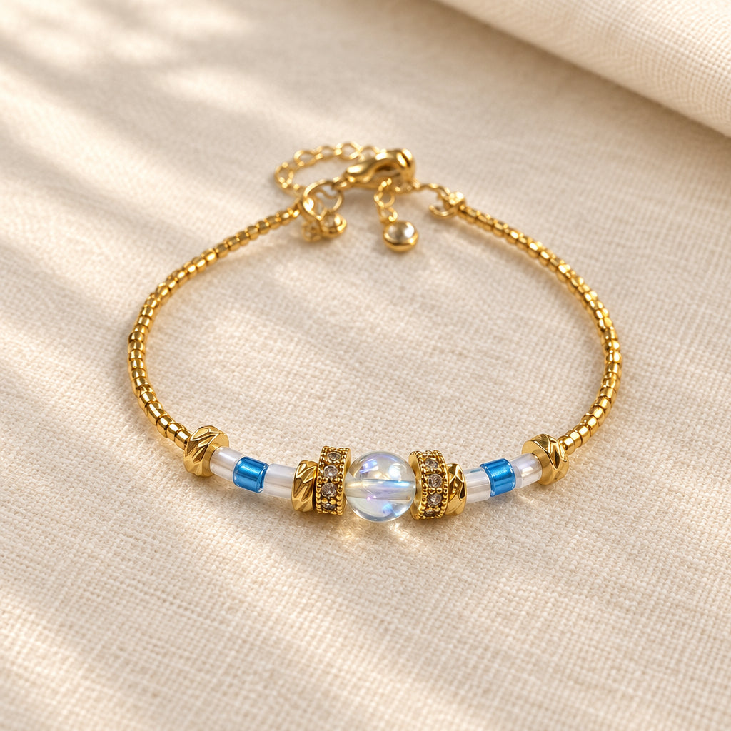 Aqua Celeste handmade bracelet with Aqua Aura crystal, Miyuki beads and 24K gold-plated details