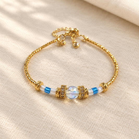 Aqua Celeste handmade bracelet with Aqua Aura crystal, Miyuki beads and 24K gold-plated details