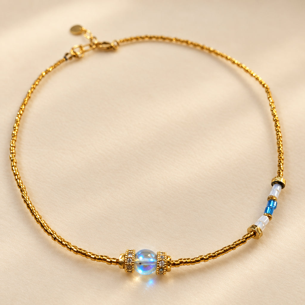 Aqua Celeste handmade necklace with Aqua Aura crystal, Miyuki beads and 24K gold-plated details