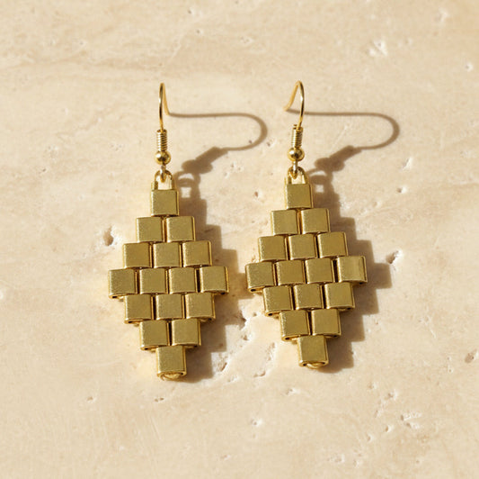 Aurea handwoven gold Miyuki Tila earrings in a geometric diamond shape