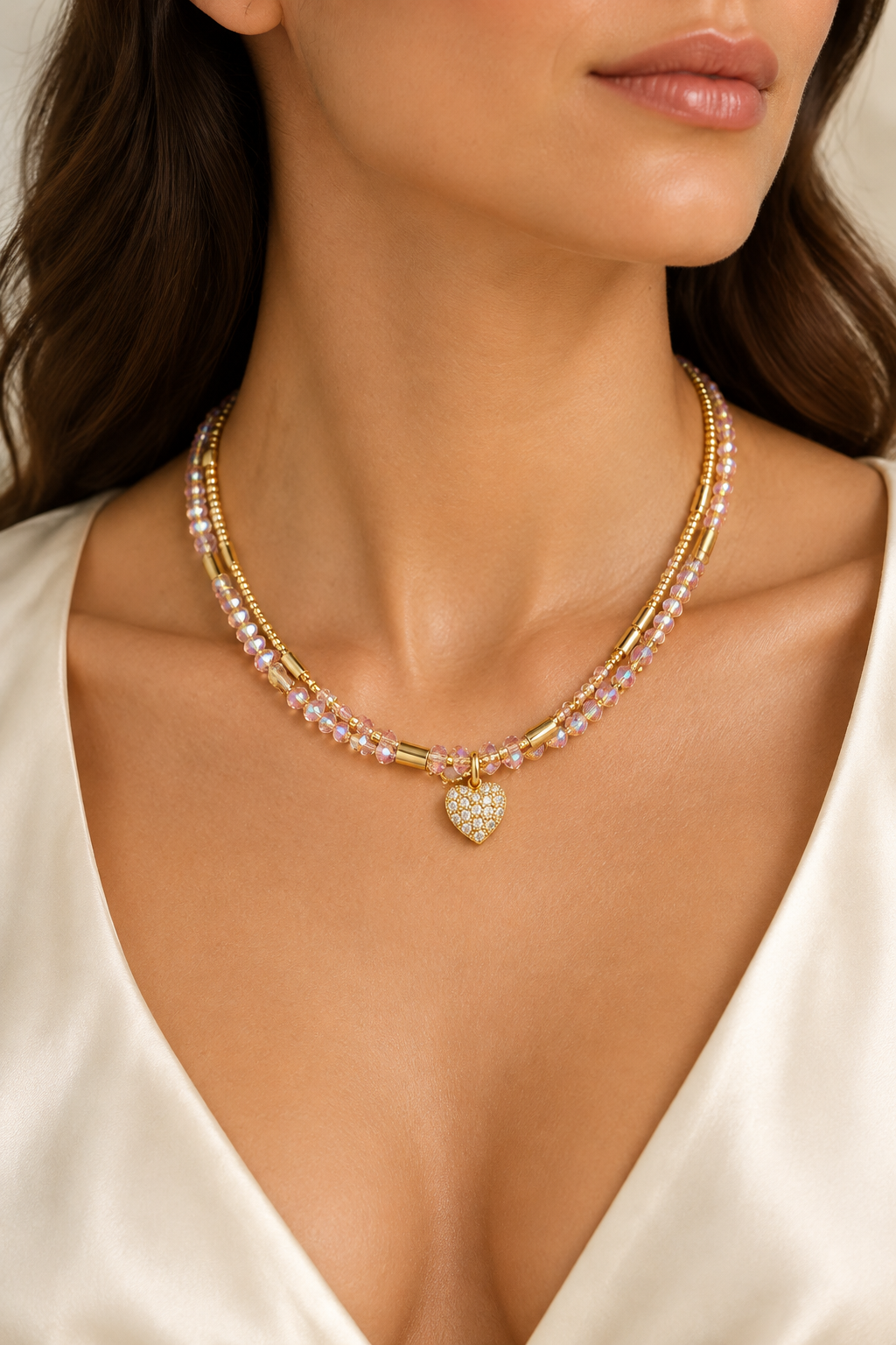 Delicate zircon and gold Miyuki necklace worn with an open neckline