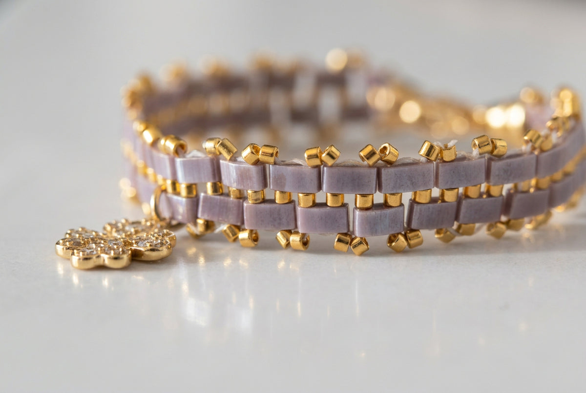 Close-up of gold-plated Miyuki beads and clover detail