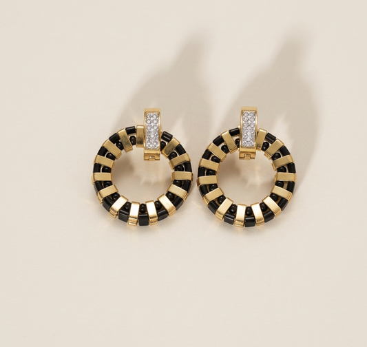 Noir Grid circular earrings with black and gold Miyuki Tila beadwork and gold-plated cubic zirconia hoops.