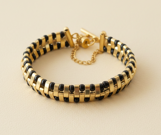 Black and gold geometric Miyuki bracelet with gold-plated adjustable clasp