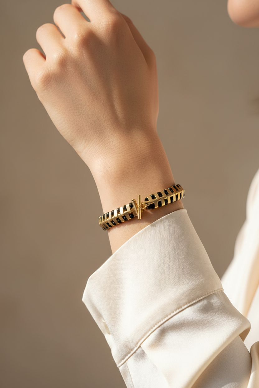 Luxury handmade black and gold bracelet on wrist