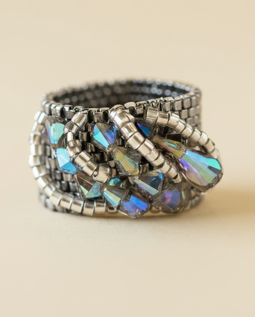 Close-up of iridescent Swarovski crystals and Miyuki Delica beadwork
