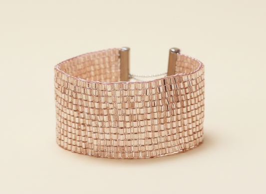 Luminous rose-gold Japanese TOHO cuff with metal clasp