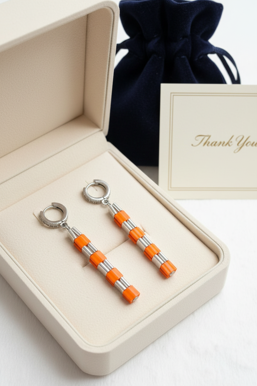 Handmade Miyuki Tila earrings displayed inside elegant gift-ready packaging.