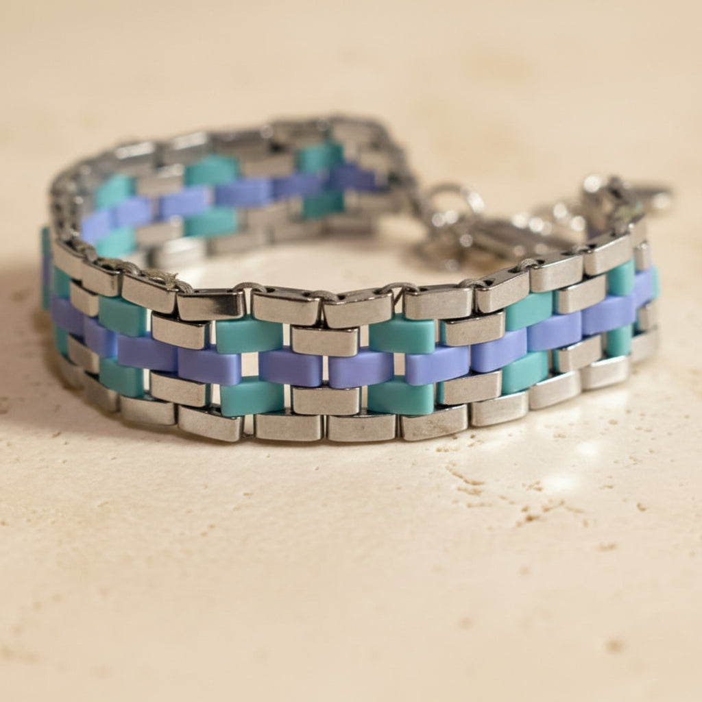 Tidal Mosaic handmade aqua and blue Miyuki Tila bracelet with silver hematite beads.